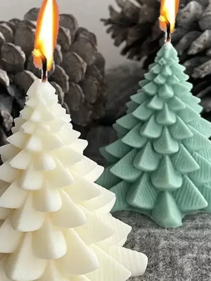 Lit Christmas tree candles, creating a festive glow.