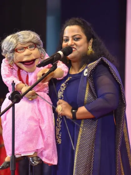 This is me and Ajji in our element, live on stage. There's a special energy when we perform for a live audience, and this photo captures the joy and connection we feel during a show.
