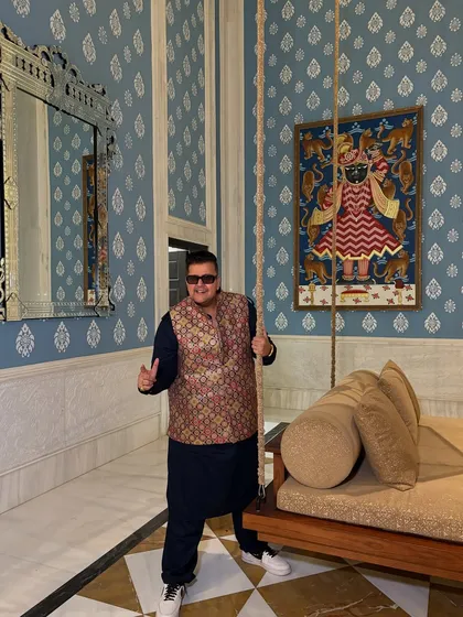 A relaxed moment before the show. Even in a grand setting, I'm always grounded and ready to connect with the people I'm performing for.
