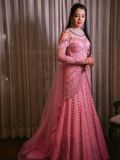 Further images showcasing my collection of modern gowns and lehengas. These photos provide different angles and details of each unique design, from romantic pre wedding shoots to elegant reception looks.