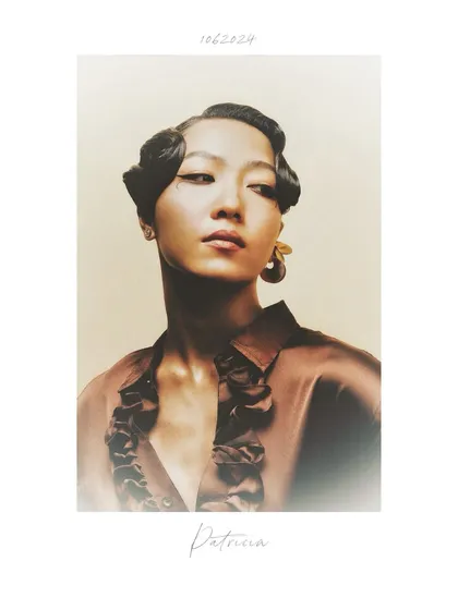 A soft, vintage-inspired portrait of Patricia. The 1920s-style finger waves and the gentle, hazy lighting create a nostalgic and romantic beauty shot.