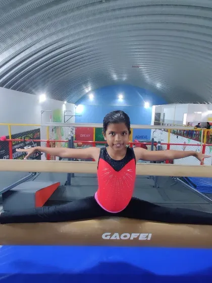 A collection of photos and videos showing our gymnasts training on various artistic apparatuses, including the balance beam, bars, and floor.