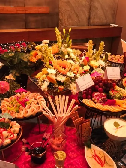 A throwback to one of our vibrant event setups, where colorful flowers and an even more colorful array of food came together to create a festive and joyful atmosphere.