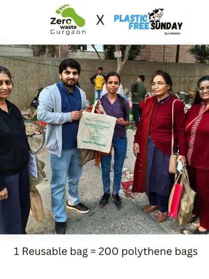 One reusable bag can replace hundreds of polythene bags. Our team poses with a happy shopper who made the switch.