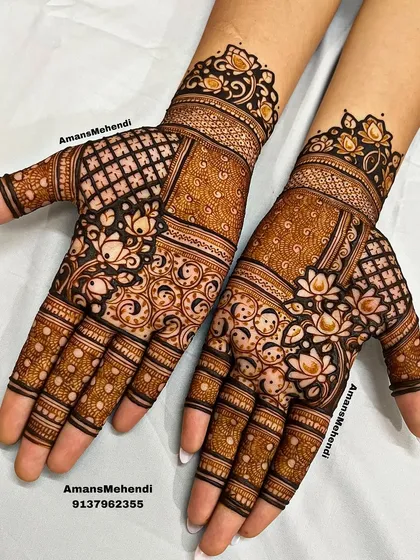 A symmetrical pair of palm designs that play with different patterns. One side features a checkerboard, while the other has swirling yin-yang like motifs, all tied together with lotus flowers.