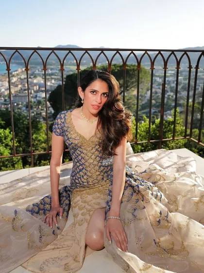 Styling for an international masquerade ball means pulling out all the stops. We worked with Versace to create this custom beaded gown for Shloka Ambani. The intricate design and stunning silhouette against the Cannes backdrop made for an unforgettable fashion story.