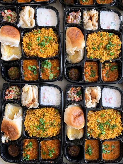 A close up of the meal trays served for an office party. Each tray is a complete meal, making it convenient and enjoyable for everyone.