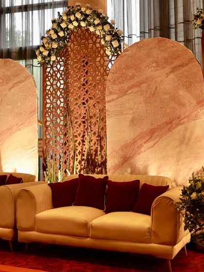 Another look at the modern-traditional stage, showing how the warm lighting enhances the textures of the marble and geometric patterns.