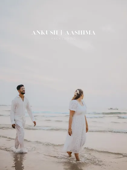 A dreamy and ethereal pre-wedding portrait on a Goan beach at dusk. The soft light and gentle waves create a beautifully romantic and peaceful atmosphere.
