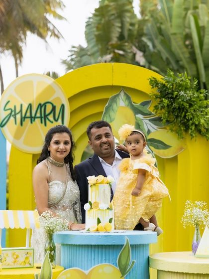 A beautiful family photo at the lemonade party, with everyone dressed to match the sunny yellow theme.