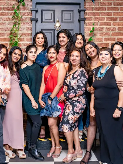 A big group of ladies celebrating together. My pub is perfect for large gatherings.