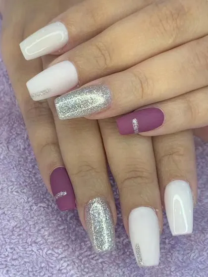 A chic and modern design combining matte mauve, glossy white, and full-coverage silver glitter nails. The simple silver line details tie the whole look together.