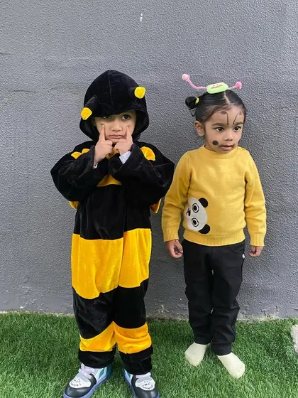 Little wings and tiny feet. For our 'Insects' theme, children came dressed as their favourite bugs. This little bee and friend are ready for a day of buzzing and learning.