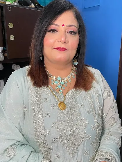 A final portrait, showing her looking confident and beautiful with her completed makeup.