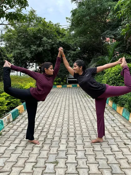 Making new friends on the yoga journey. This is a partner version of Natarajasana (Dancer's Pose), a beautiful expression of balance and support.
