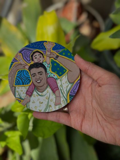 A custom coaster for Father's Day, showing a dad giving his child a piggyback ride.