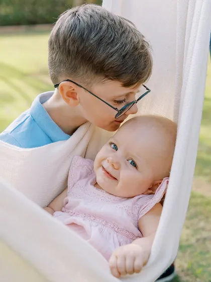 The bond between siblings is a story in itself. From a protective big brother's gentle kiss to a shared secret, I aim to capture the sweet, unfolding relationship between your children.