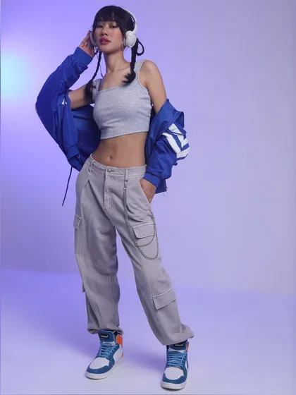 This look from my K-pop project features a layered outfit with a grey crop top, blue windbreaker, and cargo pants. The high-top sneakers and headphones complete the urban, dance-practice-inspired vibe.