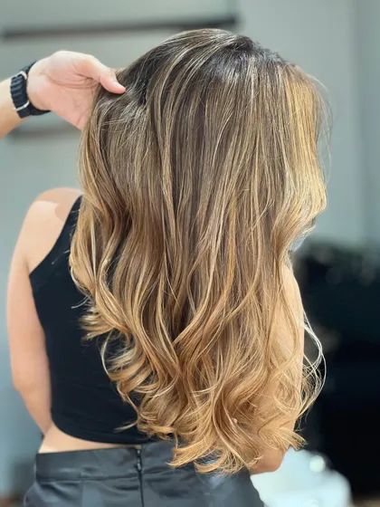 A back view of the stunning Blonde Airtouch Balayage, showing the incredible blend and healthy shine.