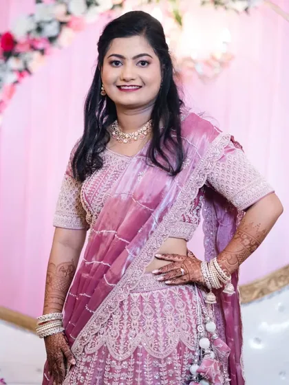 A portrait of the bride in her reception lehenga, showing the transition from the traditional Marathi wedding ceremony to the evening celebration.