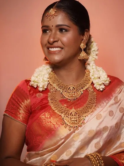 Another beautiful shot of our South Indian bride, showcasing the seamless blend of makeup and her natural beauty.