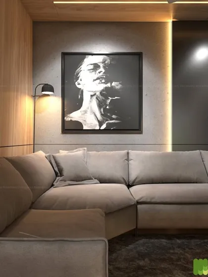 A closer look at a living room corner I designed. The combination of a plush fabric sofa, a floor lamp for ambient lighting, and bold monochrome art creates a sophisticated and cozy nook.