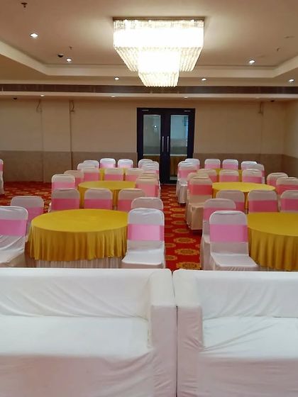The dining setup at Grand Golden Banquet in Vashi. The round tables are perfect for guests to sit and eat comfortably. This hall package is available for only 99k.
