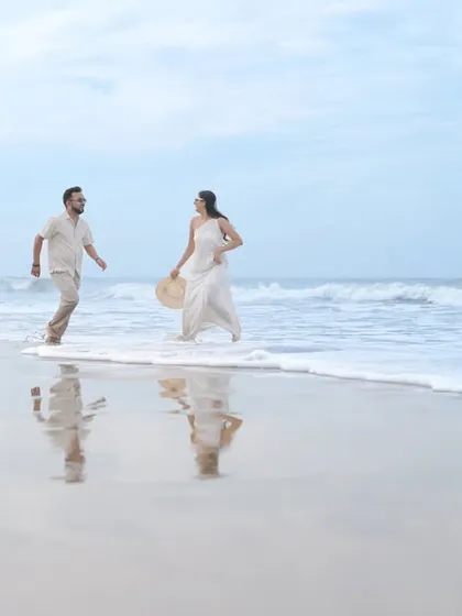 I love getting creative with props to tell a unique story. On the beaches of Goa, we used this ornate mirror to create a surreal, artistic reflection of the couple's bond against the vastness of the ocean.