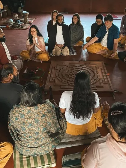 We gather in a circle for a fire ceremony. This high-angle shot shows the sense of community and shared purpose that defines our spiritual gatherings.