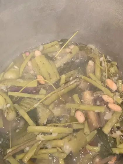 A pot of Rosop, or mixed vegetable stew, which I sometimes serve with my fish thalis.