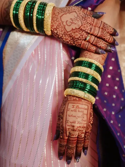 A creative detail shot of a bride's henna, uniquely designed to include her wedding vows. I believe in capturing the small, personal details that make your story unique.