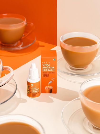 Using color theory and composition, this shot for a chai masala extract creates a modern, 3D-like effect. The clean lines and repeating elements draw the eye directly to the product, making it stand out in a crowded market.