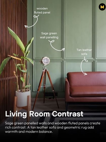 This living room shows how to create rich contrast with materials. Sage green panelled walls are paired with wooden fluted panels, while a tan leather sofa adds warmth and modern balance.