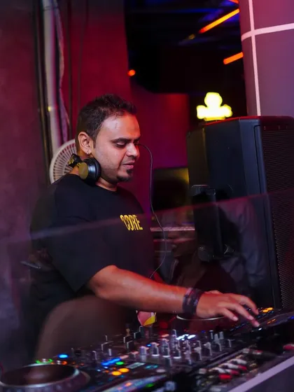A focused shot from the DJ booth, announcing my travel gigs in Hyderabad and Bangalore.