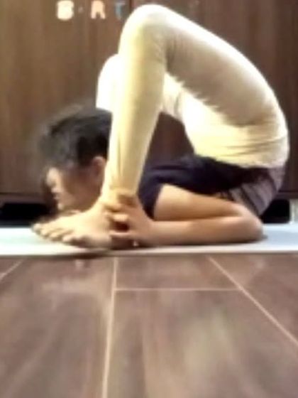 This is an advanced seated posture that requires extreme flexibility in the hips and spine. We work towards such asanas gradually through consistent practice in my online and studio classes.
