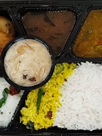 This special meal was prepared for Diwali. It features semiya payasam (vermicelli kheer) as the sweet, along with vada, sambar, dal, and a variety of rice dishes.