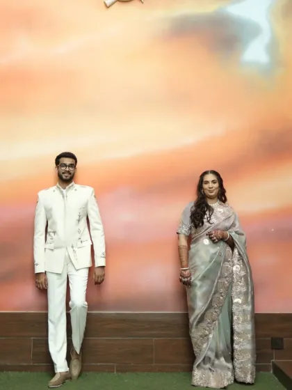 A custom-made white bandhgala suit, showcasing a blend of modern design and traditional elegance. This is a great example of the Indo-Western fusion wear I specialize in.