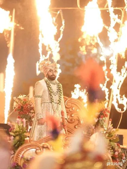 The groom's entry is amplified with dramatic pyrotechnics. I use elements like these flame jets to create a high-energy, unforgettable arrival that builds excitement for the ceremony.