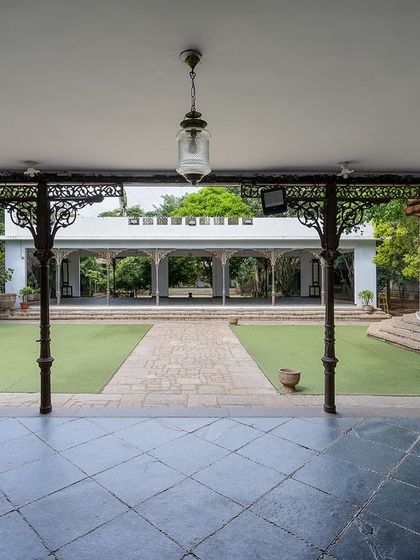 A view across the lawn towards the Colonial Bandstand, showcasing the expansive and open feel of our grandest celebration space.