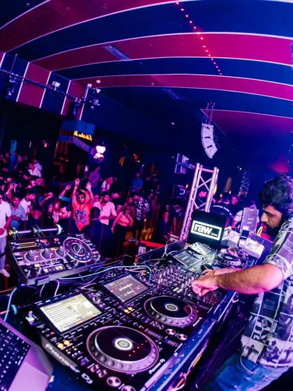 A high-angle shot from the DJ booth at Soho Delhi. The energy from a packed dancefloor is what fuels me.