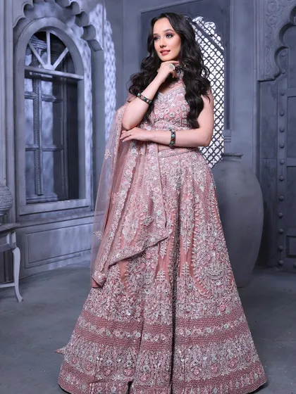 A full-length view that exudes grace and elegance. This is a perfect example of a modern, aspirational bridal look.