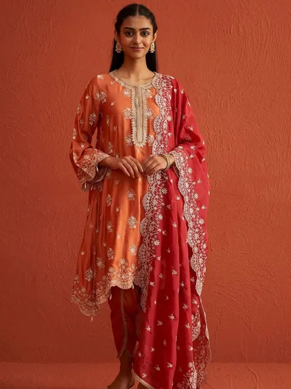 A full look at the Kangna Burnt Orange Kurta Set with its stunning red embroidered dupatta.