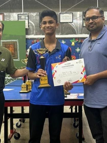 One of our dedicated players receiving his trophy and merit certificate. We celebrate every individual achievement as a victory for the entire academy.