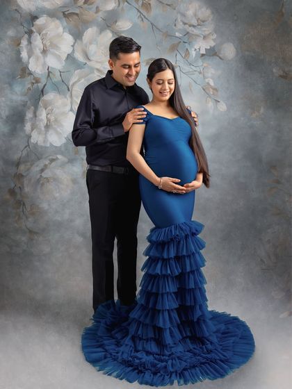 A full-length view of the dramatic ruffled blue gown, showing how I use my studio wardrobe to create impactful images.