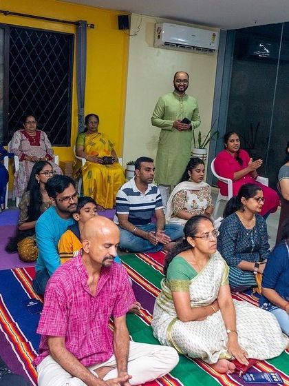 Our community members fully engaged and listening during a satsang portion of a Bhakti Immersion event.