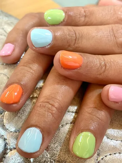 The prettiest summer nails. This simple yet beautiful manicure on short nails features a mix of lovely pastel shades.