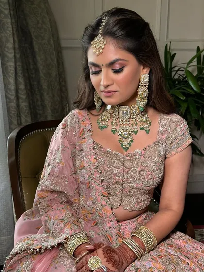 A gorgeous glam moment for the sister of the bride. I kept it delicate and fresh with soft pink shimmer on the eyes, dewy bronzed skin, and a pretty flush of color on the cheeks.