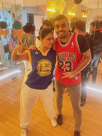 More basketball jersey fun at our Halloween social. It's great to see students bonding over shared interests, both on and off the dance floor.