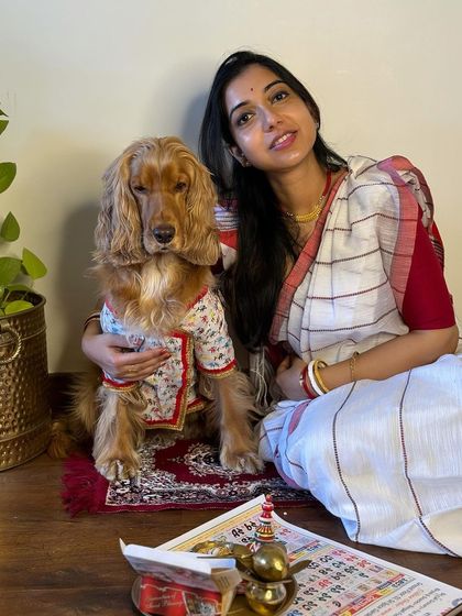 A portrait of me and Posto on Bengali New Year, ready to celebrate with family and food.