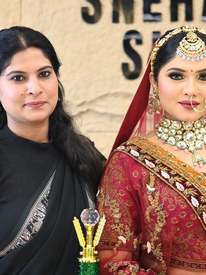 Our class winner with her stunning bridal creation. Excellence is always rewarded in my academy.